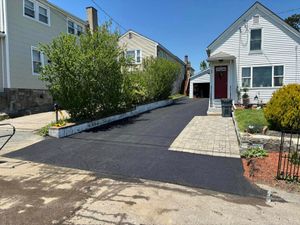 Our Asphalt Paving Services offer durable, high-quality installations of driveways, walkways, parking lots and more, enhancing your home's curb appeal with precision craftsmanship and attention to detail for lasting beauty and functionality for Staruk Trucking & Excavation Inc. in Uxbridge, MA