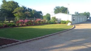 Enhance your lawn's beauty with our professional mowing service. We ensure precise cuts, optimal grass health, and pristine edges to keep your yard looking lush and well-maintained all season long. for Superior Lawn and Tree LLC in Clifton, TX