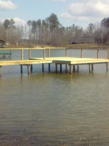 Our Dock & Boathouse Repair service offers homeowners efficient and reliable solutions to maintain, repair, and enhance their docks and boathouses for a seamless waterfront experience. for H&H Pile Drivers and Construction in Centre, AL