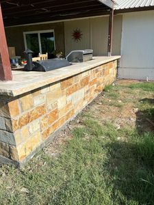 Enhance your property's landscape with our expert retaining wall construction service, providing durability and aesthetic appeal. Our skilled craftsmen ensure stability and beauty to protect your home from erosion while adding value. for J&D Masonry & Construction LLC in Arlington, TX