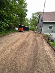 Our Skid Steer Work service provides efficient and precise land clearing, grading, and material moving for your home projects, ensuring a clean and professionally transformed outdoor space tailored to your needs. for T&D Excavating LLC. in Madison, NH