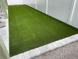 Our Synthetic Turf service offers an artificial grass installation solution for homeowners, providing a low maintenance and visually appealing alternative to traditional lawns. for Bianchi Construction Company Inc in Southport, NC