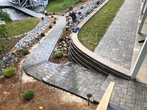 We offer comprehensive patio design and construction services to create the perfect outdoor living space for your home. for Rosales Landscaping LLC in Lake Gaston, North Carolina