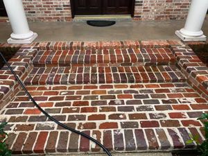 Our Hardscape Cleaning service is designed to restore and enhance the beauty of your outdoor surfaces, such as driveways, patios, and walkways through thorough pressure washing techniques. for Tavey’s Pressure Washing in Brandon, MS