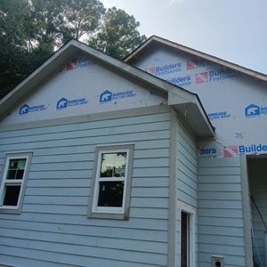 Enhance your home's curb appeal with our expert lap siding service. We specialize in transforming your vinyl siding house, ensuring durability and a beautiful finish that lasts for years. for Safe Roofing and Contracting Inc in Fayetteville, NC