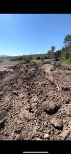 Our Land Grading service ensures a smooth, level surface for your property, improving drainage and foundation support. Trust our skilled team to prepare your land for landscaping or construction projects with precision. for Real Time Excavation & Design in West Haven, UT
