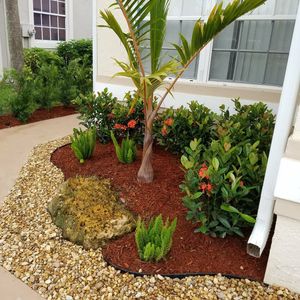 Our Mulch Installation service offers homeowners a quick and hassle-free way to enhance the appearance of their landscape by spreading high-quality mulch that helps retain moisture and suppress weed growth. for Natural View Landscape, Inc.  in Loxahatchee, FL