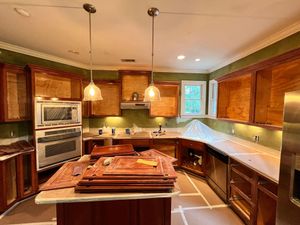 Our Kitchen and Cabinet Refinishing service can give your cabinets a fresh, new look. We'll sand down the surface of your cabinets and apply a new coat of paint or stain to give them a beautiful finish. for Castle Painting & Home Improvements in Savannah, GA