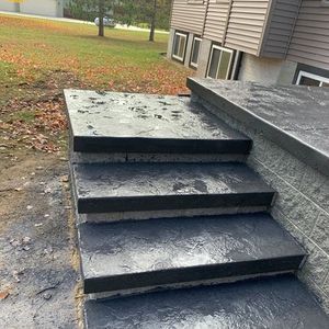 Our Stair Design & Installation service offers homeowners the opportunity to enhance their property with durable and stylish concrete stairs, expertly crafted to elevate aesthetic appeal and improve functionality in any space. for William L Cilk Concrete in Imlay City, MI