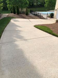 A clean driveway and sidewalk set the impression for your home. We'll remove algae and dirt buildup and leave your driveway better looking than it ever has before. for Cardwell's Contracting in Bowling Green, KY