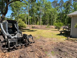 Our Dirt Prep Work service ensures optimal landscaping by offering precise grading, soil conditioning, and professional mulch installation to enhance your property's aesthetic appeal and promote healthy plant growth. for Brandon Woodard’s Lawncare in Ludowici, GA