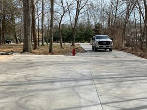 Our Concrete Driveways service provides homeowners with durable and stylish driveways tailored to their needs. We ensure quality workmanship and customer satisfaction. for Hellards Excavation and Concrete Services LLC in Mount Vernon, KY