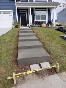 "Our Stair Design & Installation service offers homeowners a hassle-free solution to enhance their outdoor space with durable and aesthetically pleasing concrete stairs. for Low Country Concrete in Moncks Corner, SC
