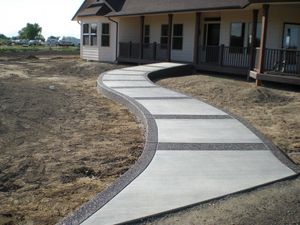 Our Sidewalk Installation service offers homeowners a convenient and professional solution for adding durable and aesthetically pleasing concrete sidewalks to their property. for All Mighty Concrete LLC in Bremerton, WA