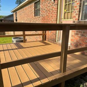 Our Decks service offers homeowners high-quality construction and remodeling solutions for creating beautiful, durable, and functional outdoor living spaces that enhance their home's aesthetics and overall value. for Quality Painting & Construction  in Russellville, AR