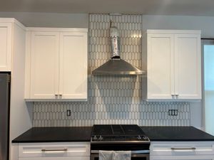Enhance your kitchen's aesthetic with our professional backsplash tiling service, providing expert design and installation to ensure a stunning focal point that's both durable and easy to maintain. for Salcedos Ceramic & Tile in Bartow, FL
