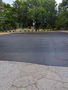 Protect your driveway with our professional Asphalt Sealcoating service. Extend the life of your asphalt surface, enhance its appearance, and prevent damage from UV rays, water penetration, and daily wear-and-tear. for Burning it Concrete LLC in Raleigh, NC