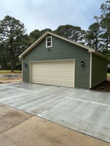 Enhance your home's functionality with our Custom Garages, tailored to fit your needs and style, complementing our other services that ensure top-quality new construction from foundation to finishing touches. for Tidal Homes Inc. in Chesapeake, VA