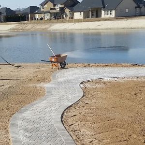 Enhance your outdoor living space with our expert patio design and construction service, blending style and functionality to create a personalized haven for relaxation, entertainment, and enjoyment right in your backyard. for Mike's Grading Plus in Caldwell, ID