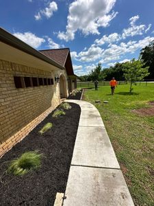 Enhance your home's curb appeal with our professional stone veneer installation service. We create stunning, durable borders that blend seamlessly into any landscape, adding elegance and value to your property. for Fine Line Lawn Care & Landscaping in Aledo, TX
