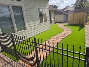 Enhance your home's outdoor beauty with our premium artificial turf service, offering realistic, low-maintenance lawns that stay lush year-round. Enjoy eco-friendly solutions that save water and reduce yard upkeep effortlessly. for Bruno's Professional Lawn's & Landscape in Beaumont, TX