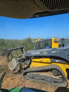 Our Skid Steer Work service offers efficient and precise earthmoving for your landscaping, grading, and material handling needs, ensuring a seamless transformation of your outdoor space with professional expertise. for Hernandez Land Clearing Services in Alice, TX