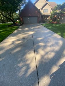 Our Driveway and Sidewalk Cleaning service will remove years of built-up dirt, grime, and stains using powerful pressure washing techniques, leaving your property looking fresh and well-maintained. for Power Washing 219 in Saint John, IN