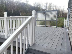 Our Deck Staining and Restoration service provides professional maintenance for aging and weather-worn decks, enhancing their appearance while protecting them from further damage. for The Deck Hand in Parkesburg, PA