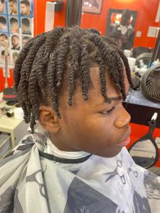 We offer professional hair braiding services in our salon, from traditional box braids to intricate cornrows. Our experienced stylists provide high quality results with quick turnarounds. for Pascy Hair Braiding Salon & Barber Shop in Baltimore, MD