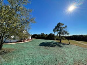 Our hydroseeding service combines water, seed, fertilizer, and mulch to efficiently and effectively establish new turf on your property. Get lush grass quickly with our professional hydroseeding services today! for CreekSide HydroSeeding & EarthWorks in Calhoun, GA