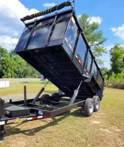 Our Dump Trailer Services offer convenient and efficient disposal solutions for homeowners' landscaping and hardscaping projects, ensuring a seamless cleanup process. for K & A Landscaping, Inc. in Jacksonville, FL