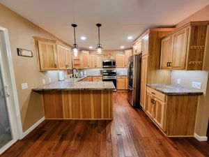 Our Kitchen Renovation service is a comprehensive remodeling and construction service that includes the design, planning, and installation of a new kitchen. We can work with your existing layout or help you create a brand-new kitchen that meets your needs and budget. for Buckwood Builders in Dundee, MI