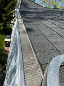 Our Gutter Cleaning service ensures a clean and free-flowing gutter system, preventing water damage and maintaining the functionality of your home's drainage. for Klean it Kens Pressure Washing in New Haven, IN