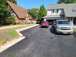 At Daybreaker Landscapes we can help with your driveway replacement project. We offer all material types asphalt, concrete, gravel, and pavers. for Daybreaker Landscapes in McHenry County, Illinois