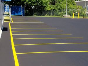 Enhance your property's safety and appeal with our professional striping service, ensuring clear, precise lines for driveways or parking lots that promote organization and boost your home's overall curb appeal. for Specialty Paving and Sealcoating in Gallatin, TN