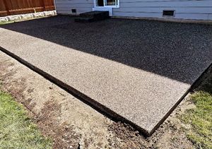 Our Concrete Flatwork service offers homeowners the expertise and craftsmanship to create beautiful and durable surfaces such as patios, walkways, driveways, and foundation slabs for their outdoor spaces. for A Living Art Landscaping in Everett, WA