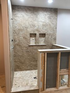 Our tile shower service creates beautiful, durable, water-resistant showers with expert installation and precision craftsmanship. We help homeowners upgrade bathrooms with custom designs, quality materials, and long-lasting performance we can trust. for Ellis Custom Floors in Stanberry, MO