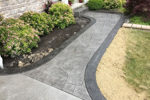 Transform your outdoor space with our reliable sidewalk installation service. Our skilled team ensures durable, aesthetically pleasing concrete pathways that enhance safety and curb appeal for your home. Your satisfaction is our priority. for Southern Oak Concrete and Construction LLC in McDonough, GA