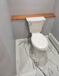 Transform your bathroom into a stylish, functional space with our expert renovation services. Our skilled carpenters blend quality craftsmanship and innovative design to create bathrooms tailored to your personal taste and needs. for Tuplin and Sons  in Braintree, MA