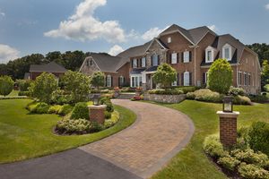 Our Driveway Design & Build service offers homeowners a comprehensive solution for creating a beautiful and functional driveway that seamlessly blends with their landscaping. for Dove Springs Landscaping Services in Austin, Texas