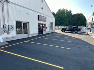 Our Asphalt Parking Lot Construction service provides durable, high-quality surfaces for residential properties, enhancing curb appeal and functionality. Trust our expert team to deliver timely installations tailored to meet your specific needs. for Reynoso’s Asphalt Service in Leominster, MA