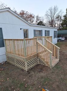 Transform your outdoor space with our expert deck and patio installation services. We create durable, stylish environments tailored to enhance beauty and functionality, perfect for relaxation or entertaining guests. for Building Faith in Sallisaw, OK