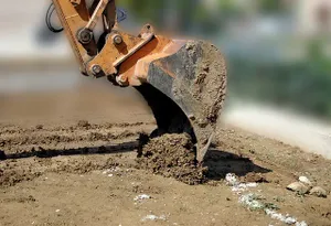 Our Dirt Work service offers expert land preparation, excavation, and grading to ensure your construction project starts with a solid foundation, optimizing stability and drainage for long-lasting results in any remodeling or building venture. for JC’S Flooring Services in Marietta, GA