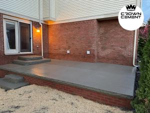 Transform your outdoor space with our Sidewalk Installation service. Our experienced team will install a durable and visually appealing concrete sidewalk that enhances the curb appeal of your home. for Crown Cement in Lincoln Park, MI