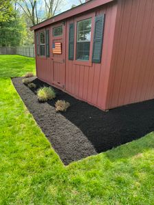 Enhance your landscape with our professional mulch installation service, offering superior moisture retention and weed control while adding a polished finish to your garden—all completed by experienced lawn care experts. for Adams Landscaping in Springfield, MA