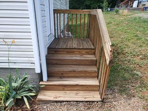 Our professional staining service is designed to enhance the aesthetic appeal of your home by providing a long-lasting finish to surfaces such as decks, fences, and patios. for High Definition Pressure Washing in Asheville, NC