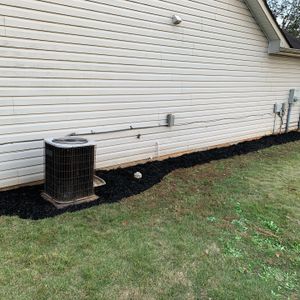 Enhance your lawn's health and appearance with our Mulch Installation service. Our team will carefully apply mulch to your landscape to retain moisture, suppress weeds, and promote plant growth. for Sanders Landscape & Maintenance in McDonough, GA