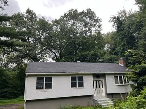 Our roofing service provides homeowners with top-quality and reliable solutions for all their roofing needs, ensuring a durable and aesthetically pleasing roof that protects their home. for Laura Mae Properties in Wolcott, CT