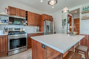 Our kitchen and cabinet refinishing service rejuvenates your space with a fresh, modern look. Transform outdated cabinets into stylish focal points, enhancing beauty and functionality without the cost of full replacement. for New Vibes Painting in Minnetonka, MN