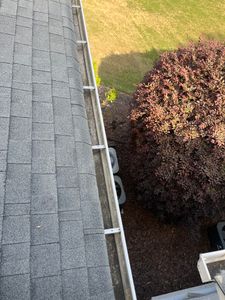 Our professional Gutter Cleaning service ensures your home's gutters are free from debris, preventing clogs and water damage during rainstorms. for Southern Exterior Solutions in Raeford, NC